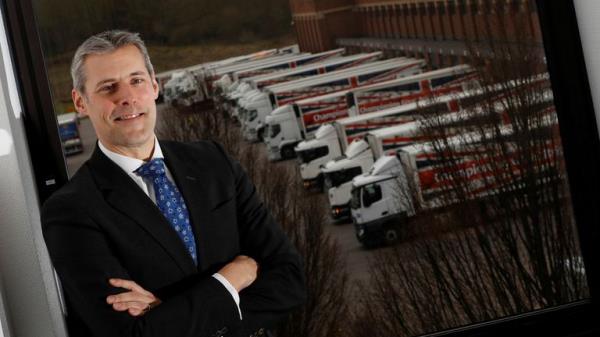 Aldi Chief Executive Matthew Barnes poses at Aldi&#39;s distribution centre in Atherstone, Britain February 9, 2017. Picture taken February 9, 2017. REUTERS/Darren Staples