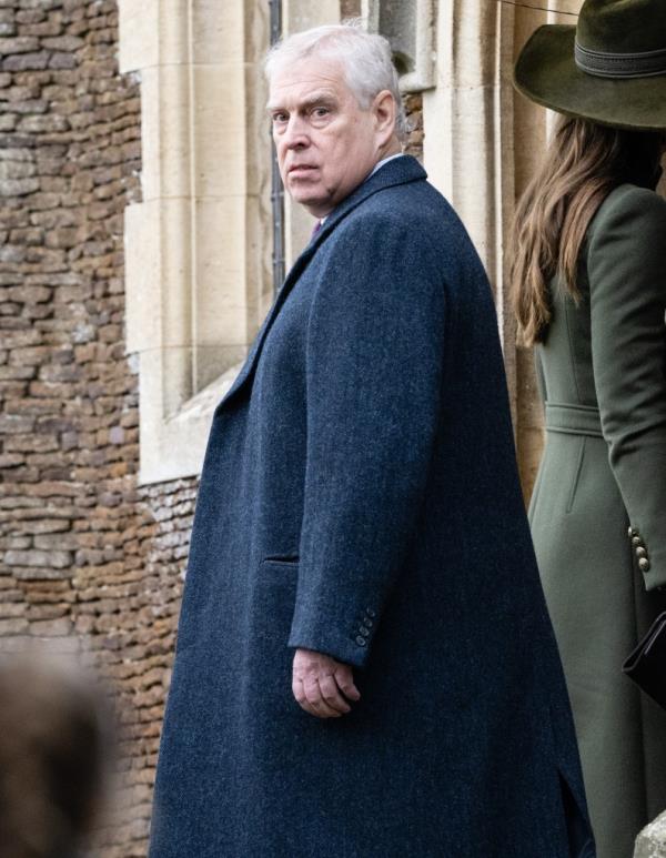 Prince Andrew scowling. 